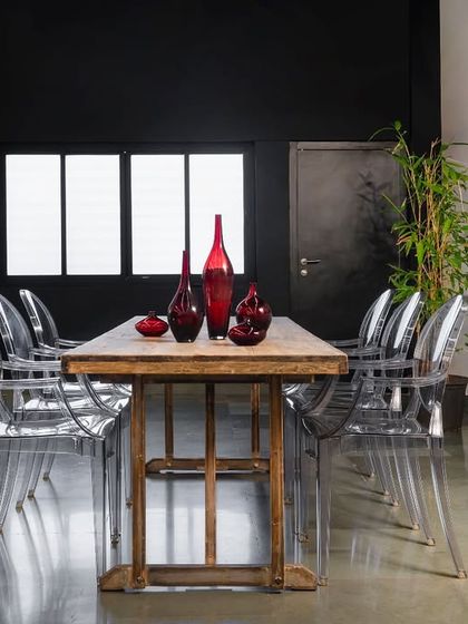 The stunning conference room of a high-end Italian boutique showroom. Stepping out of my comfort zone with an industrial chic aesthetic allowed me to create something truly extraordinary.