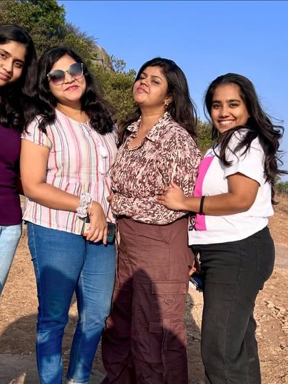 A group of friends posing during the Skandagiri trek. Our trips are perfect for squads looking for a weekend adventure.