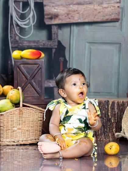 A look of surprise and delight from our little mango lover.