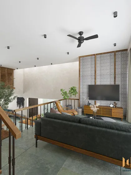 The view from the top of the stairs, looking down onto the mezzanine lounge area.
