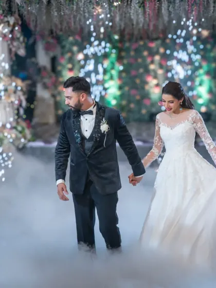 Creating a fairytale first dance moment. With a bit of smoke and dramatic lighting, we can turn your wedding reception into a scene from a movie. It’s all about making your big day unforgettable.