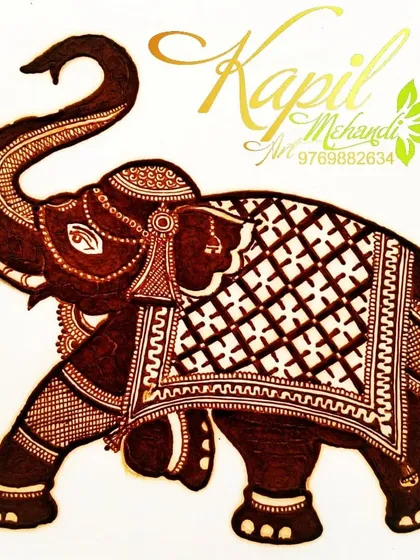 A detailed drawing of a decorated elephant, a symbol of royalty and good fortune. I can incorporate motifs like this into your larger bridal design.