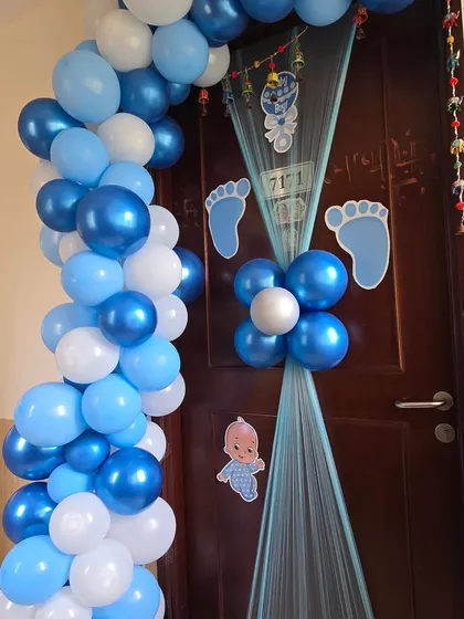 Another view of the blue and white door decoration for welcoming a baby boy.
