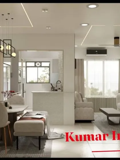 A bright, all-white living and dining area that exudes modern luxury. The design uses clean lines, reflective surfaces, and strategic lighting to create a spacious and sophisticated ambiance.