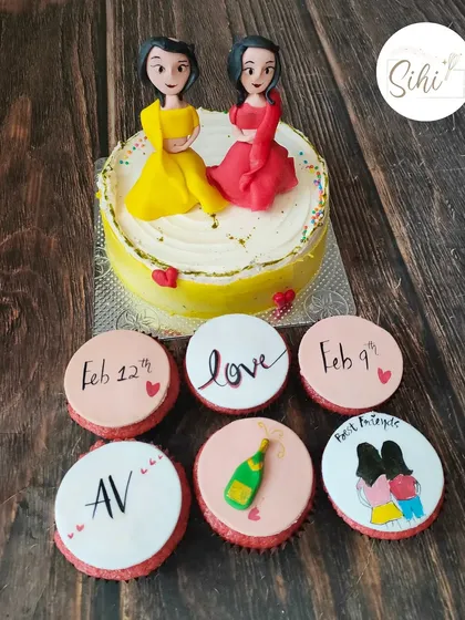 A beautiful set for two best friends getting married days apart. The cake features custom figurines, and the cupcakes are decorated with significant dates and inside jokes.