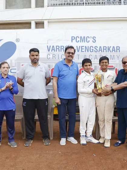 Presenting the Varroc Cup U-15 trophy to the winning team captains. A well-deserved victory.