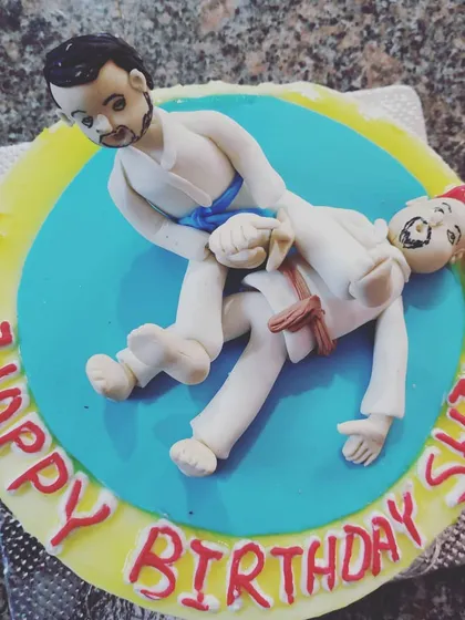 One of the best birthday cakes I've ever received, from my students. It shows why I love jiu-jitsu. It's the gentle art where a smaller person can prove that technique overcomes strength.
