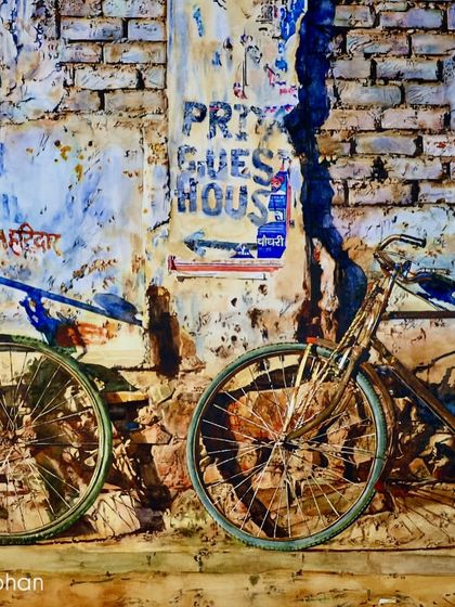 This 2018 watercolor of two bicycles is a story of companionship and time. The weathered wall and torn posters in the background add to the nostalgic, everyday feel of the scene.