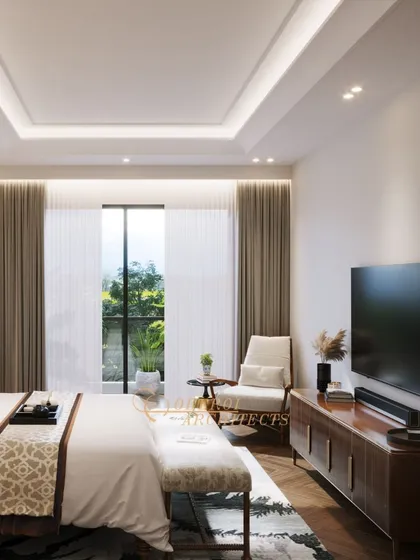 The room includes a modern media console, providing storage and a place for a TV without cluttering the serene atmosphere.