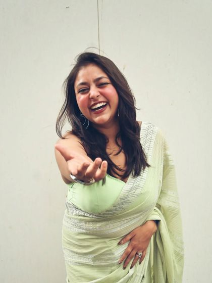 A candid laugh in my beautiful green saree. These are the moments I love, just feeling happy and confident in what I'm wearing.