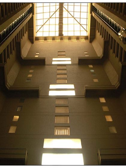 A different perspective of the twin tower atrium in Lower Parel. The geometric precision and the skylight at the top create a cathedral-like space within a residential building.