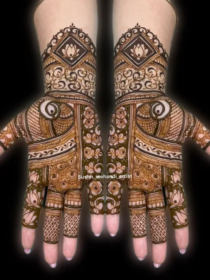 A stunning design with a mix of modern and traditional elements. The lotus and eye motifs are surrounded by intricate patterns.