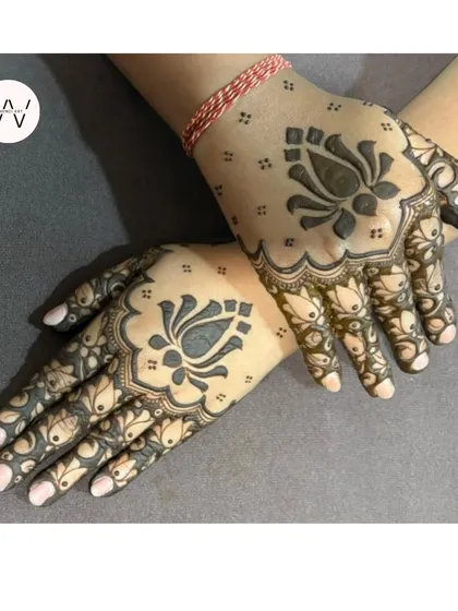 Sometimes, a bold and beautiful lotus is all you need. This design focuses on the lotus as a central mandala, creating a striking and elegant look that's perfect for any celebration, like Diwali.