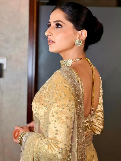 Elegant Updos & Floral Buns photo 13