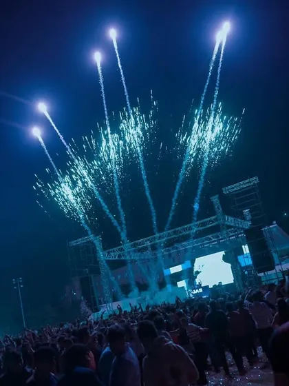 Fireworks lighting up the sky over the crowd during a campus tour performance. I always aim to end the night with a bang.