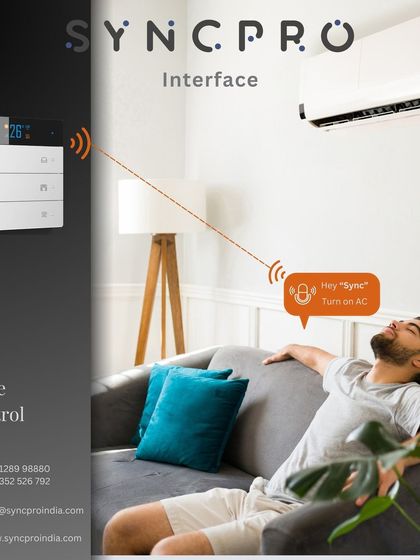 Comfort without lifting a finger. This image illustrates how our voice control system works, allowing a user to relax on the sofa and simply say, "Hey Sync, Turn on AC," to activate the air conditioning via the smart keypad.