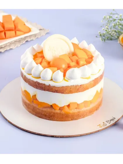 My Mango Vanilla Cake is a seasonal favorite. It features layers of soft vanilla sponge, light whipped cream, and generous amounts of fresh mango pulp and chopped Alphonso mangoes for a refreshing taste.