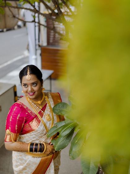 A duplicate of ID 269, this portrait captures a bride's happy expression on her wedding day.