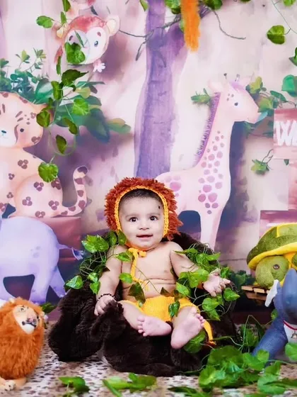 A baby boy dressed as a little lion king in our 'Welcome to the Jungle' themed set.