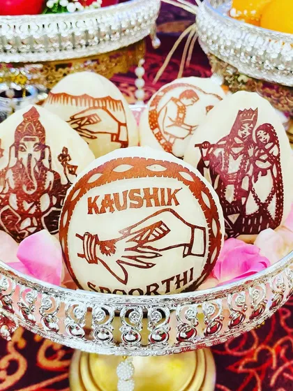 The small details matter the most. I offer personalized coconut carving for engagements and weddings, featuring the couple's names and traditional designs. It’s a unique touch that clients always love.