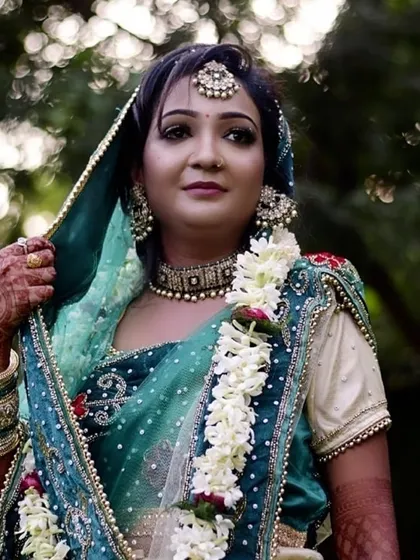 I love working with colors beyond the traditional red. This bride's teal and green saree was the inspiration for her makeup, which features earthy tones and a soft glow, proving that your bridal look can be unique and personal.