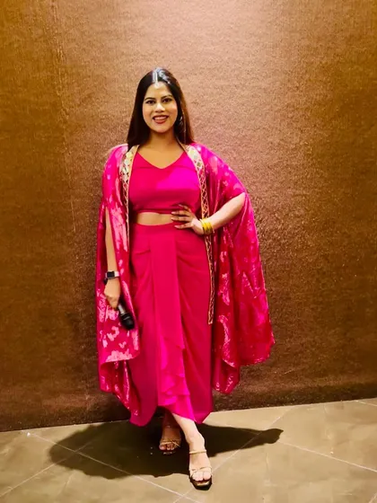 A bright pink outfit for a festive occasion. I love experimenting with vibrant colors.