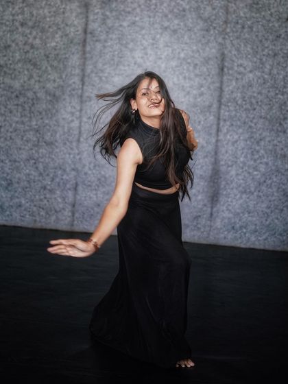 Capturing the dynamic movement of hair and fabric during a spin. My choreography often incorporates these elements to create visually striking moments.