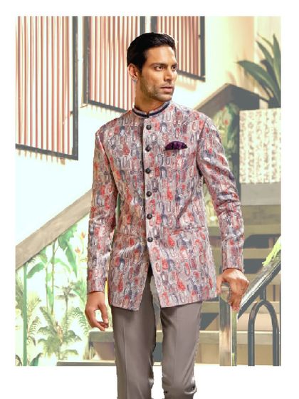 This printed bandhgala jacket is a bold, modern statement. The abstract pattern and sharp tailoring make it a unique choice for receptions and celebratory evenings.