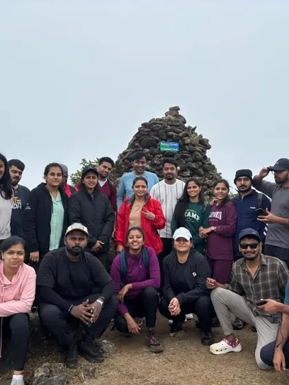 A large group photo at the Kumaraparvatha peak, showing the diverse mix of people who join my treks.