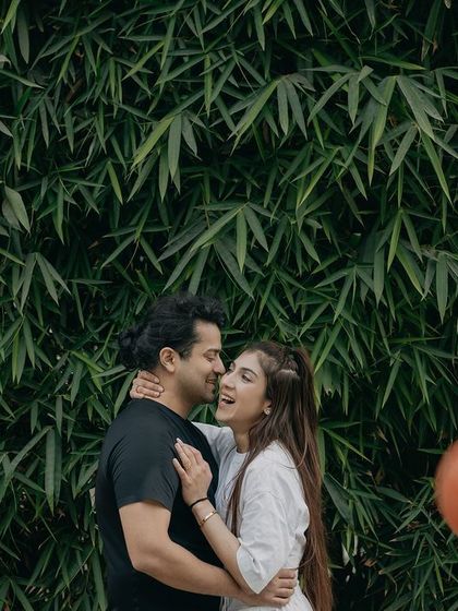 A candid laugh during a basketball-themed shoot. Capturing these spontaneous moments of joy is what makes a pre-wedding session truly personal.