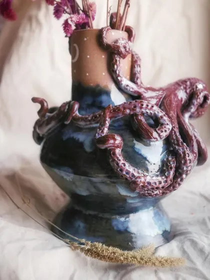 This octopus vase is a piece of my heart. It started as a simple wheel-thrown form, and then I spent hours sculpting each tentacle, giving it life and movement. This is what I love about hand-building, the slowness and the storytelling.
