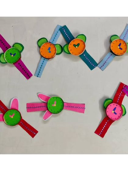 Look at these colorful and quirky paper watches. This craft activity helps children learn about telling time in a playful and interactive way.