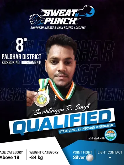 Saubhagya R. Singh, a competitor in the Above 18 adult category, after winning his silver medal. Our adult kickboxing classes are perfect for improving fitness and learning self defense.