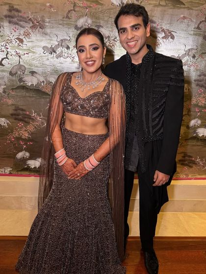 Full-blown glam was the mood of the day. For this reception look, I created a soft glam eye with a defined contour to make her features pop.