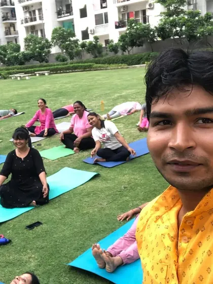 A happy selfie with my students after a refreshing outdoor yoga session. Seeing them relaxed and smiling is the best part of my job.