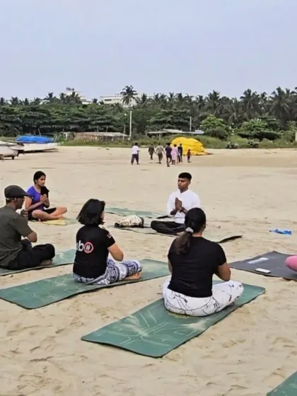 Leading a sunset session on the sand. There is a special energy when we practice together, guided by the ocean breeze. In my group workshops, I help you find your center and connect with a community of like-minded people.