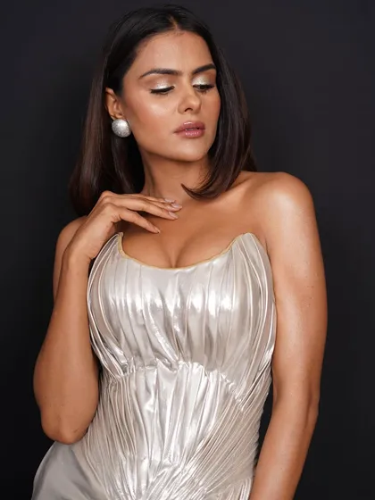 A beauty-focused shot of Priyanka with her eyes closed, emphasizing the metallic eyeshadow and serene expression. This adds a soft, artistic touch to a glamour portfolio.