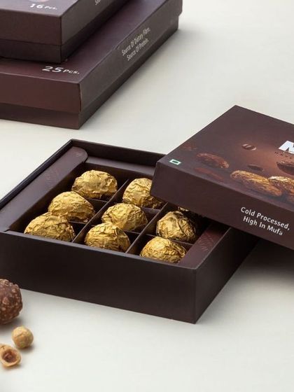 Our Hazelnut Truffles are available in multiple gift box sizes, including this 9-piece option. The packaging highlights the cold-processed method we use to preserve the quality and flavor of the toasted nuts and chocolate.