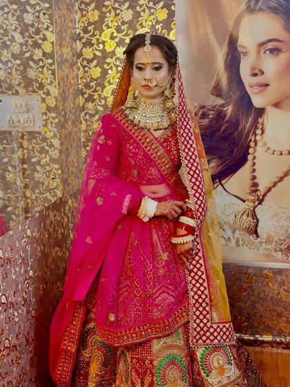 A full-length view of one of my brides. I always work to ensure the makeup harmonizes with the entire outfit, jewelry, and hairstyle for a cohesive and breathtaking final look.