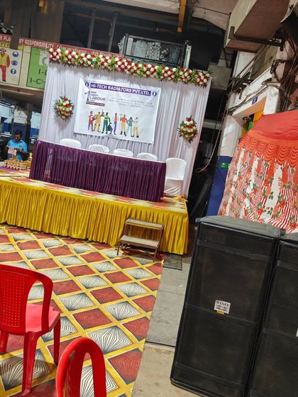 Another angle of the Labour Day event, showing my speakers positioned next to the stage to provide clear audio for the audience.