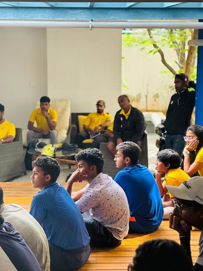 A group of our junior and senior athletes engaged in a nutrition workshop. We believe in building healthy habits that will serve them throughout their entire athletic careers.