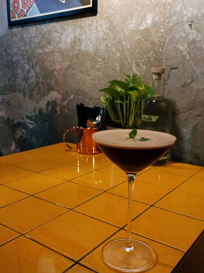 A moody shot of a cocktail on a bright yellow table during my Goa trip. I love playing with contrast and ambiance to create visually interesting content that tells a story about the place.