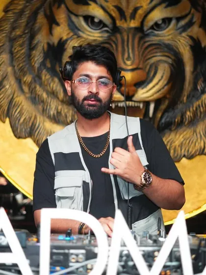 Rocking a utility vest in front of the iconic Badmaash tiger.