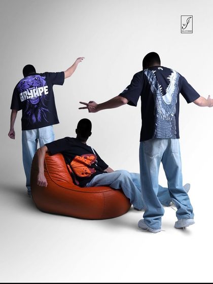 Another composition from the invisible fashion series, this time showing the models interacting with each other and a prop, creating a dynamic scene that highlights the brand's t-shirt designs.