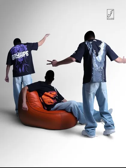Another composition from the invisible fashion series, this time showing the models interacting with each other and a prop, creating a dynamic scene that highlights the brand's t-shirt designs.