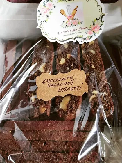 Our Chocolate Hazelnut Biscotti, packed and ready for your chai time. Each piece is twice-baked for that perfect crunch and loaded with nuts, offering a truly homemade taste you won't find in stores.