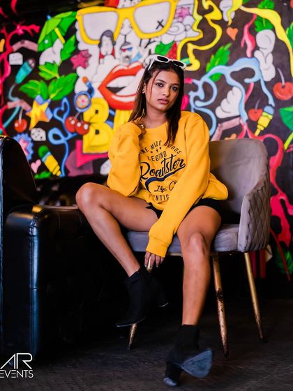 A guest posing in a comfy yet stylish outfit.