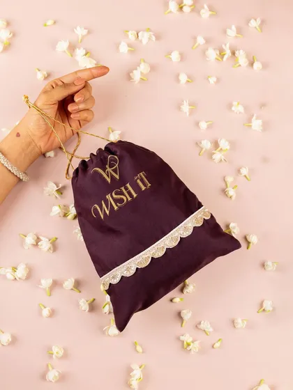 The first look at my wedding thamboolam collection. This deep purple potli shows how I mix traditional concepts with chic, modern design to create favors guests will talk about long after the wedding.