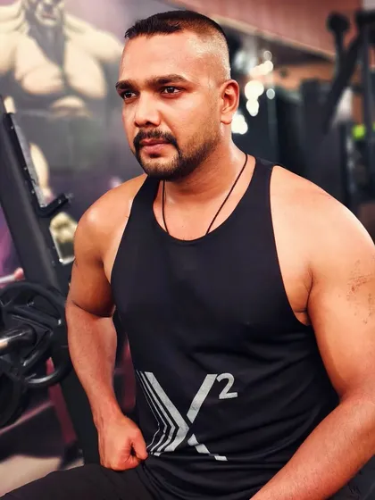 A moment of focus in the gym. Strength training is as much a mental exercise as it is physical.