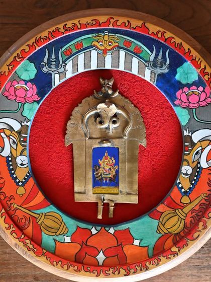 The complete Mangal (Mars) frame, a tribute to the fiery red planet. The artwork incorporates symbols of leadership and power, such as the mace and spear, with Lord Narsingh incarnated from Mangal at its heart.
